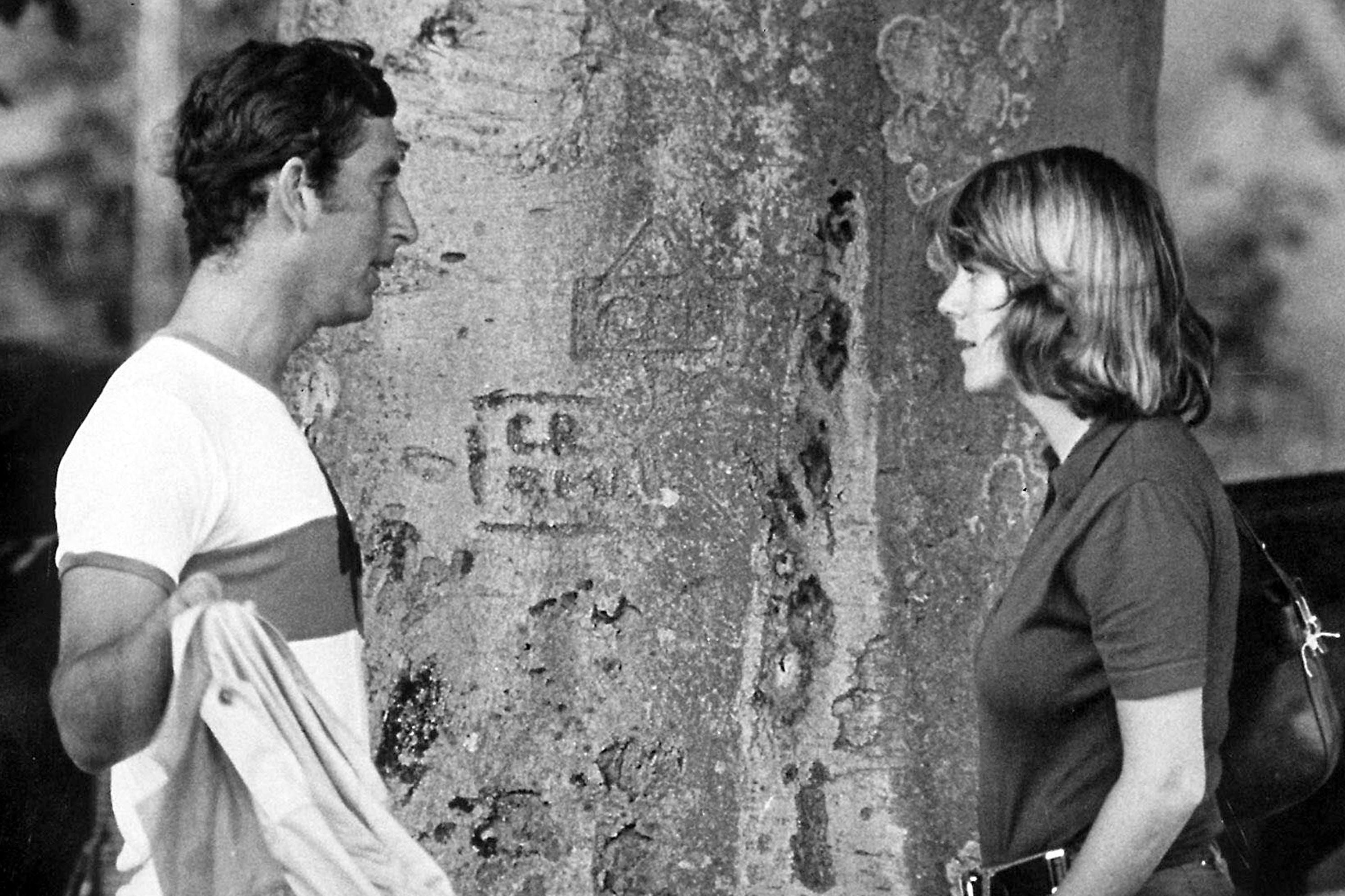 Prince Charles talks to Camilla Parker Bowles at a polo match.